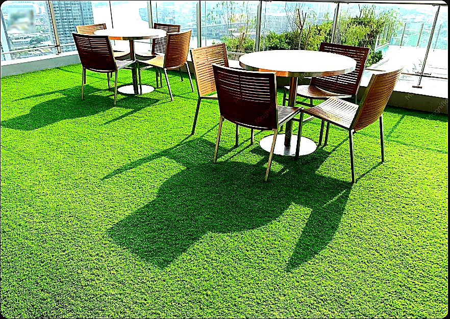 Terraza con césped sintético instalado por A&R Gramas en Cali, Colombia